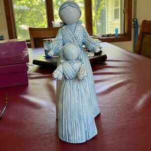 Pair of ceramic cornhusk dolls